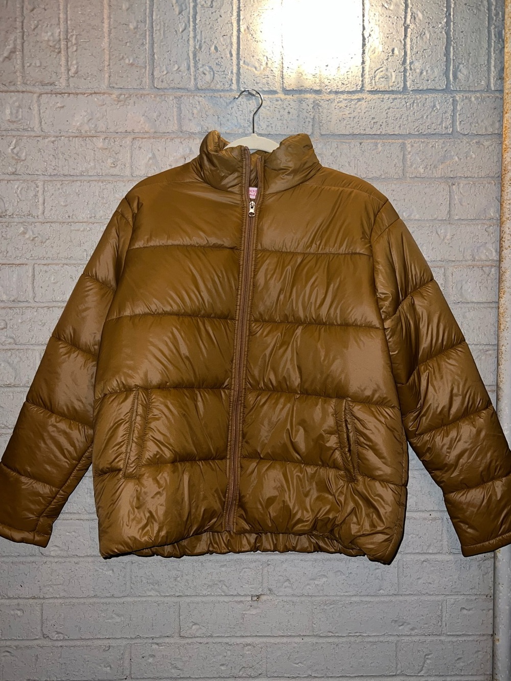Puffer Jacket size large in the color camel
